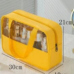 grande-trousse-de-toilette-jaune-transparente-femme2