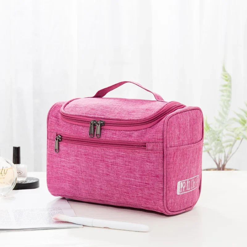 trousse-de-toilette-avion-rose-femme