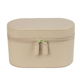 trousse-de-toilette-beige-en-cuir-voyage-femme