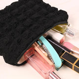 trousse-de-toilette-noire-matelassee-femme4