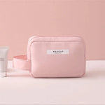 trousse-de-toilette-rose-femme