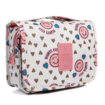 trousse-de-toilette-rose-smiley-avec-compartiment-femme