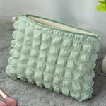 trousse-de-toilette-verte-matelassee-femme-v2