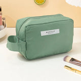 trousse-de-toilette-verte-voyage-femme